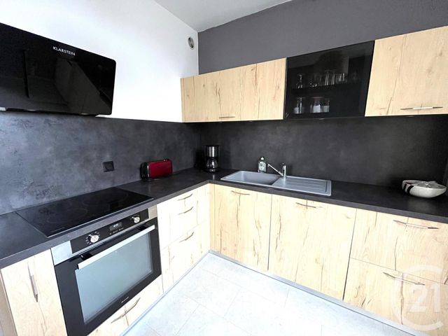 Appartement T2 à louer - 2 pièces - 61.62 m2 - POUILLEY LES VIGNES - 25 - FRANCHE-COMTE - Century 21 Avenir Immobilier