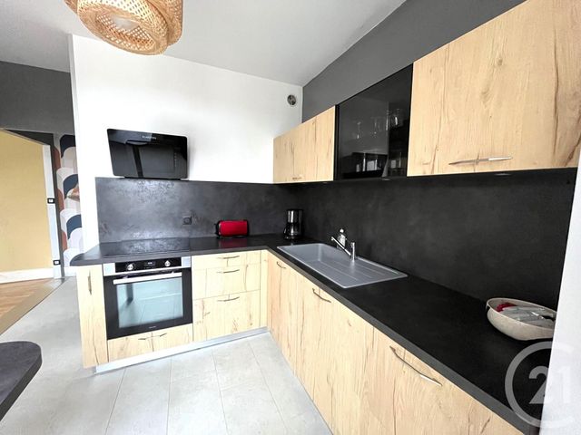 Appartement T2 à louer - 2 pièces - 61.62 m2 - POUILLEY LES VIGNES - 25 - FRANCHE-COMTE - Century 21 Avenir Immobilier